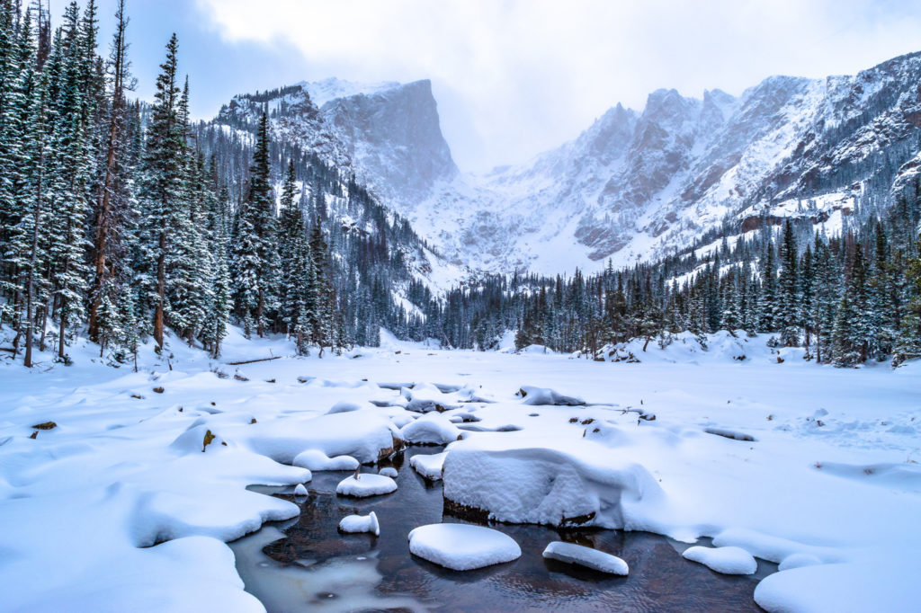A snowy mountain scene, photo taken by Jeremy Janus Photography