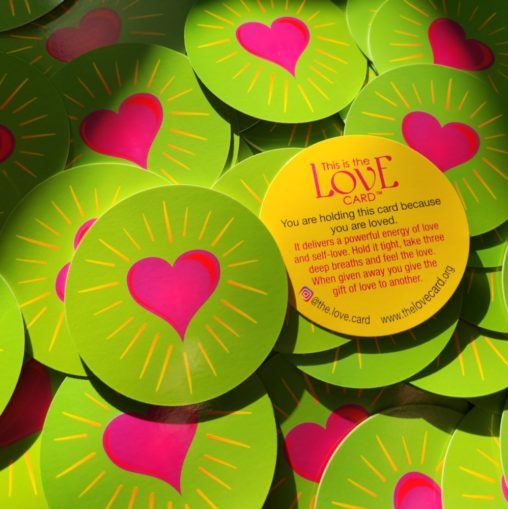 A stack of Love Cards from thelovecard.org