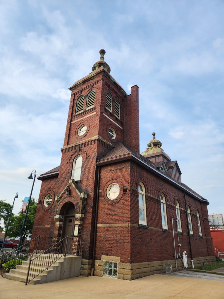 A brick church building with a cathedral that used to be a Romanian Orthodox Church and is now owned by the Cleveland Public Theatre. Located at 6201 Detroit Ave.